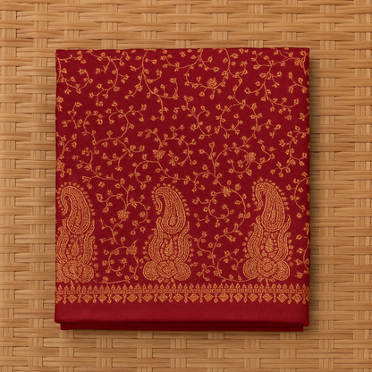 Deep maroon base with rust-gold needle embroidery.