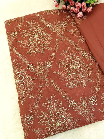 Timeless Elegance: Rust Chiffon Laser-Cut Embroidered Ensemble