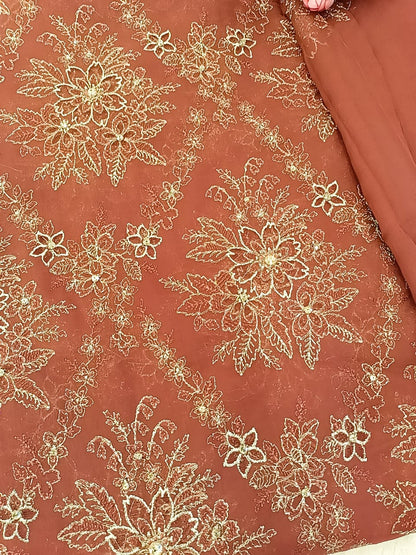 Timeless Elegance: Rust Chiffon Laser-Cut Embroidered Ensemble